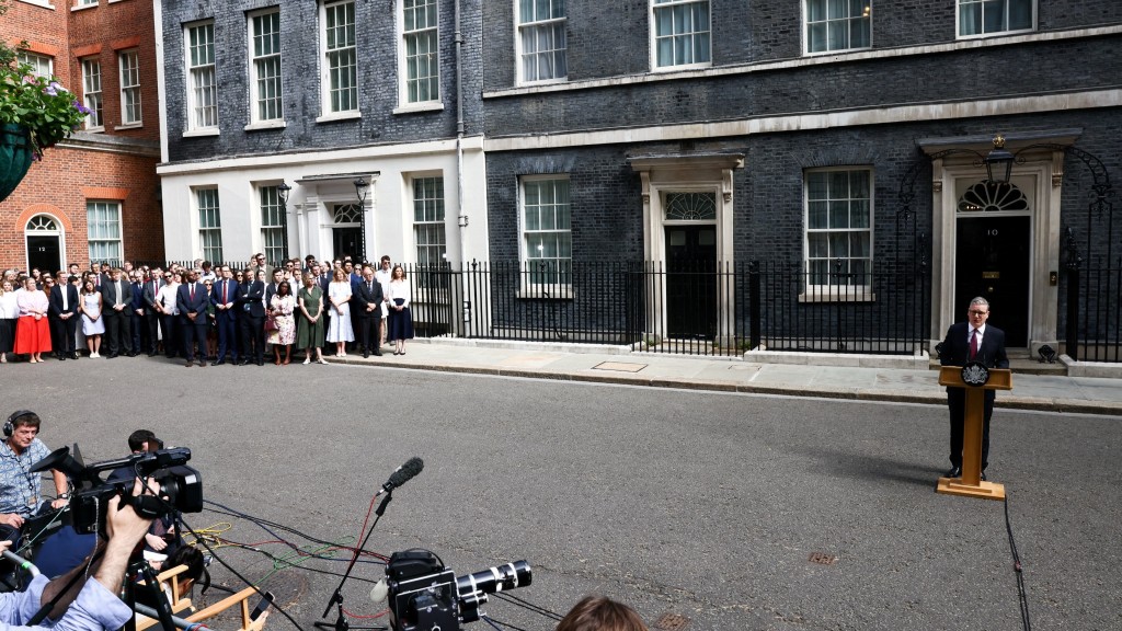 英国首相施纪贤宣布辞职。 路透社 英国首相施纪贤宣布辞职。 路透社
