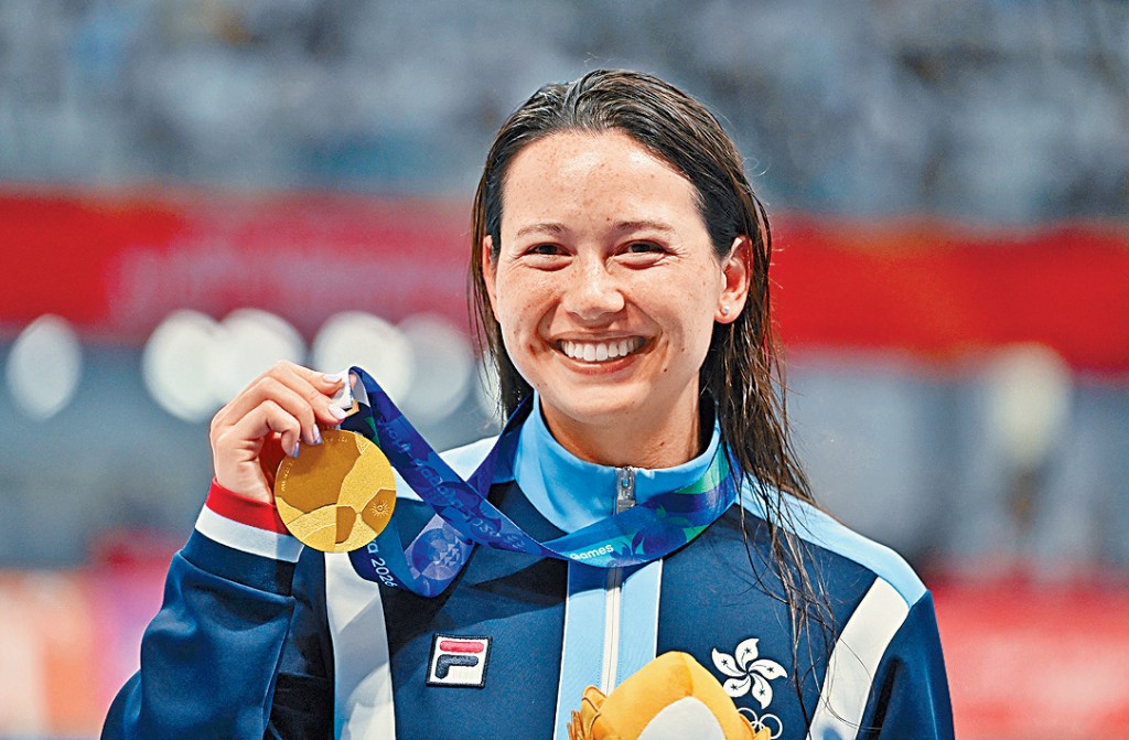 女飞鱼何诗蓓于200米自由泳轻松夺金。 女飞鱼何诗蓓于200米自由泳轻松夺金。