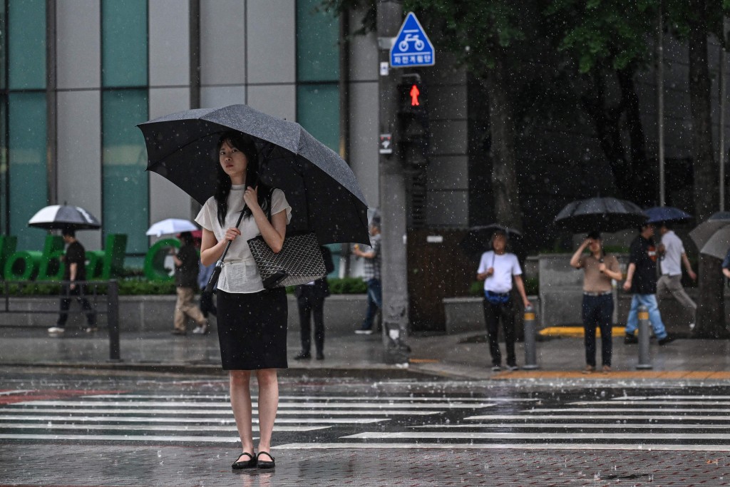 南韩多处降下豪雨。法新社
